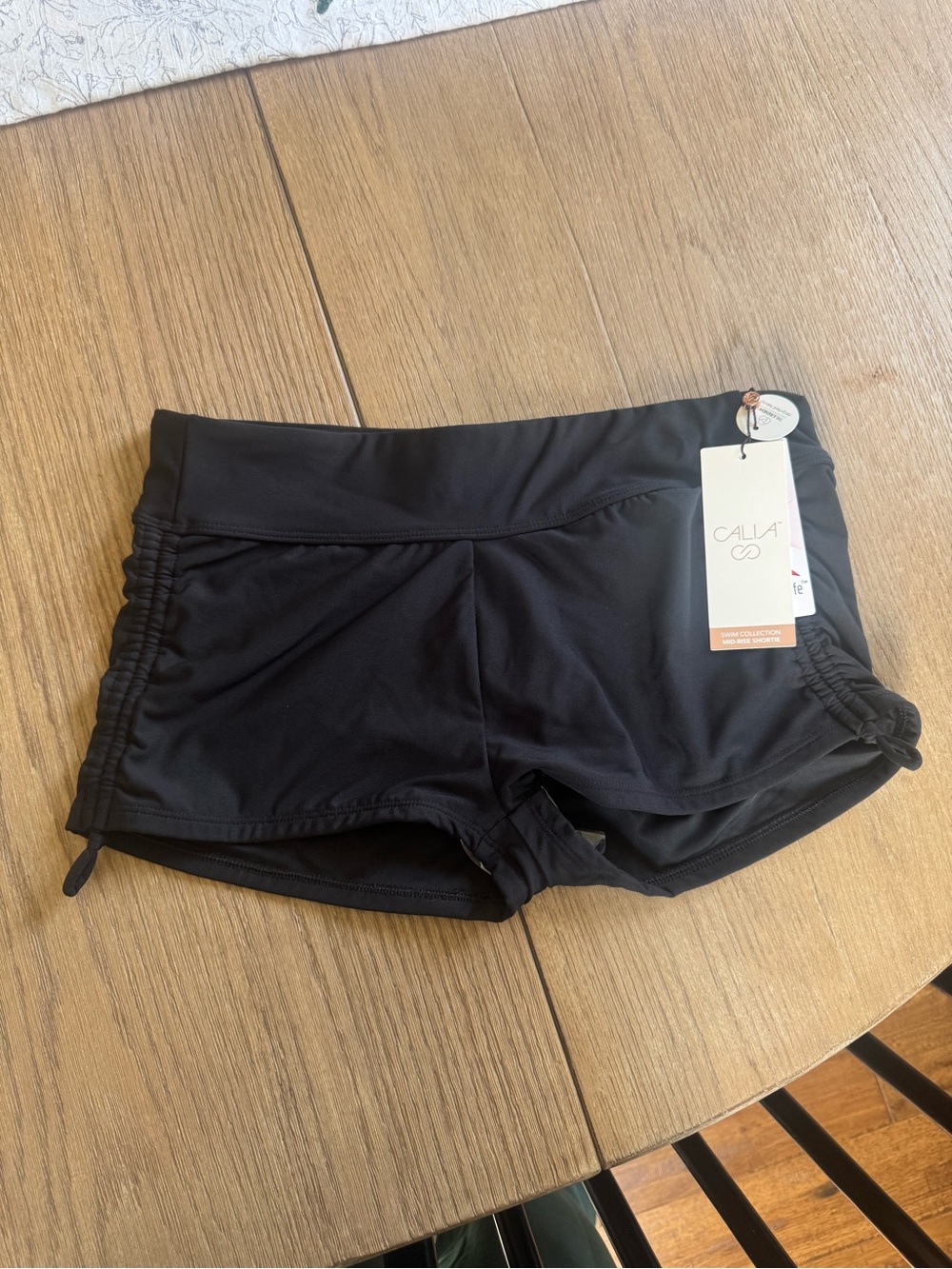 Calla swim shorts size small NWT